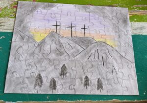 Drawing of three crosses on a hill