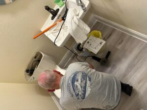 Man working in a bathroom